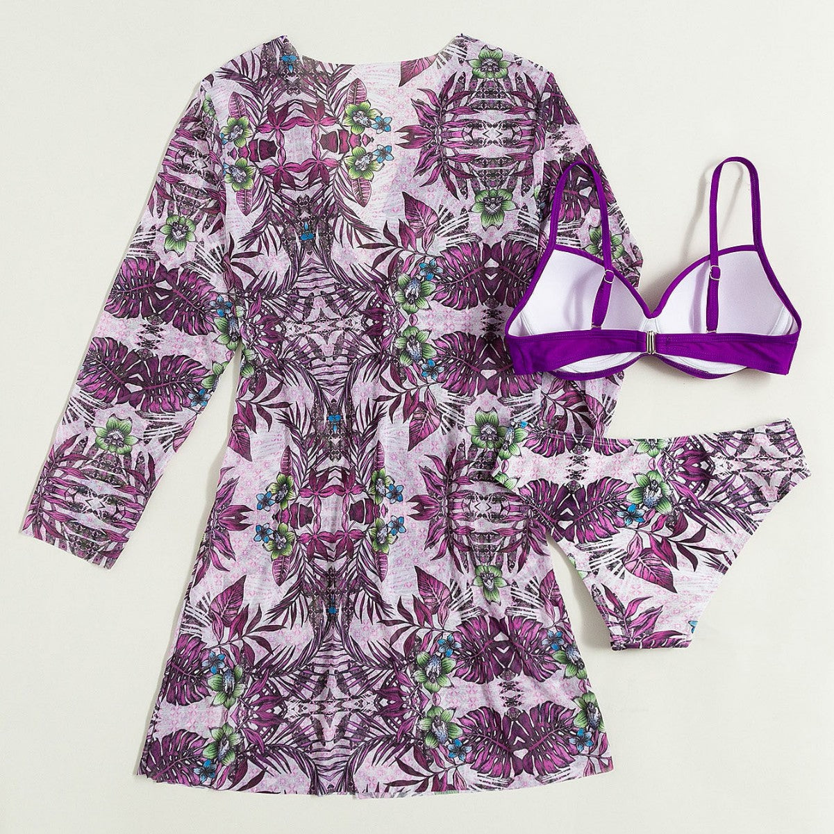 Women's purple and white bikini swimwear with shrug cover up