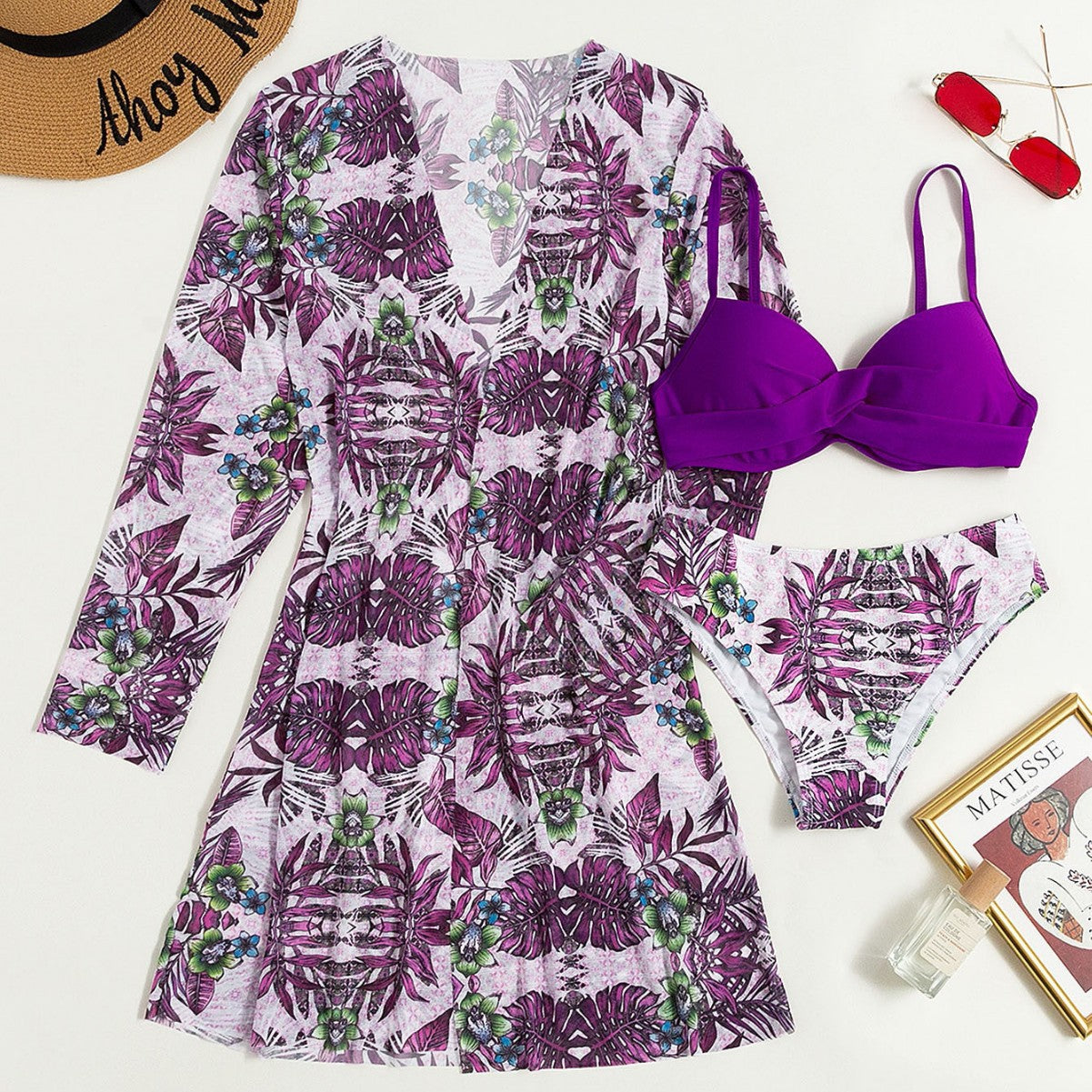 Women's purple and white bikini swimwear with shrug cover up